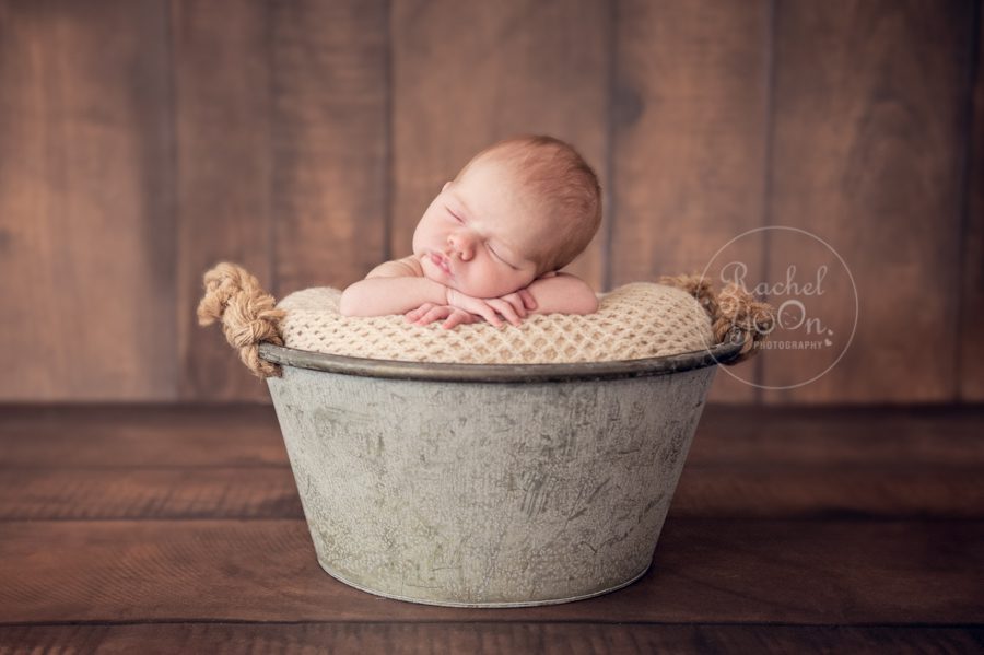 newborn baby in a metal bucket - Newborn Photography Vancouver