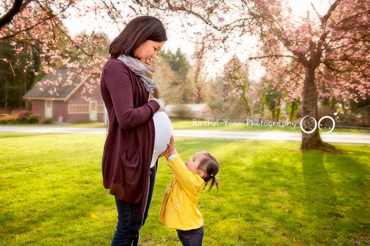 older kid touching the belly - Maternity Photography Vancouver