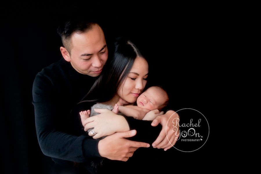 newborn baby boy with mom and dad - Newborn Photography Vancouver