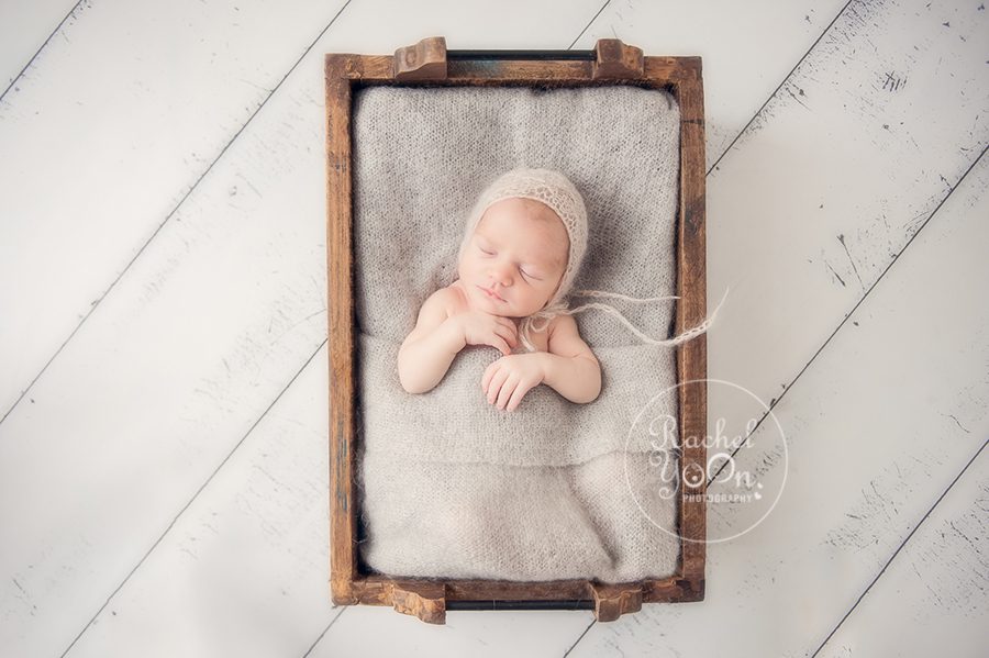 baby girl in a wooden box - Newborn Photography Vancouver