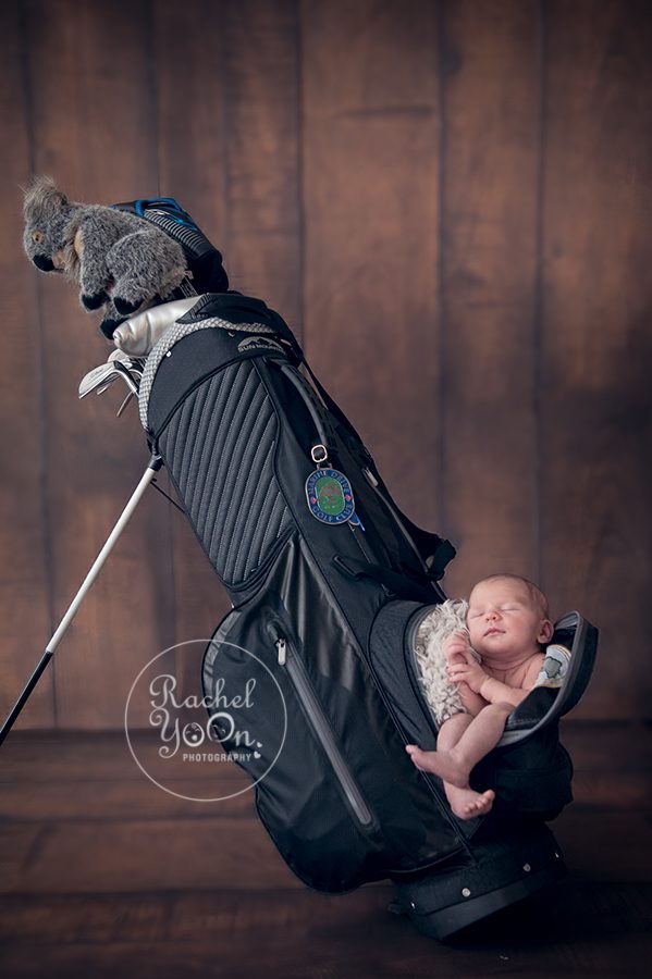 baby girl in a golf bag - Newborn Photography Vancouver