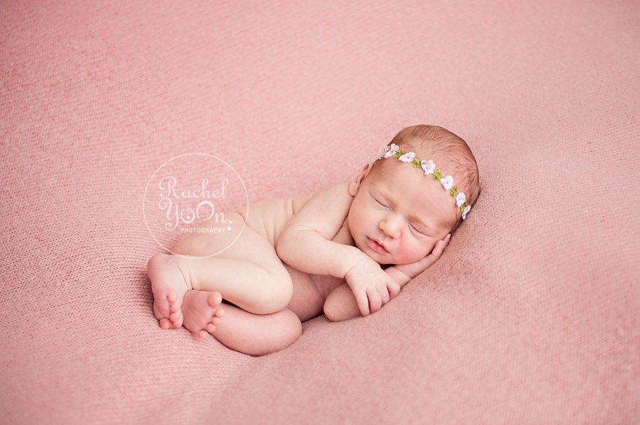 newborn baby girl on a bean bag - Newborn Photography Vancouver
