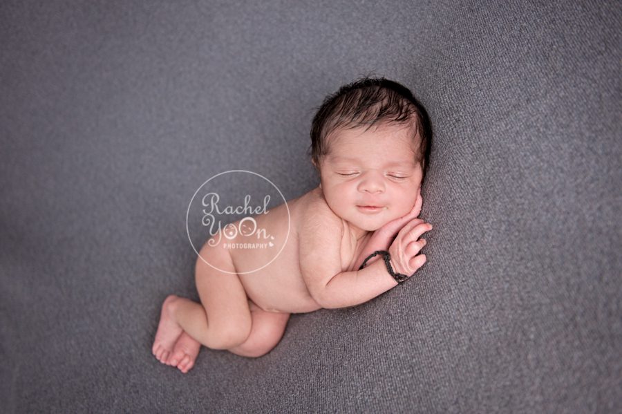newborn baby boy lying on a blanket - newborn photography vancouver