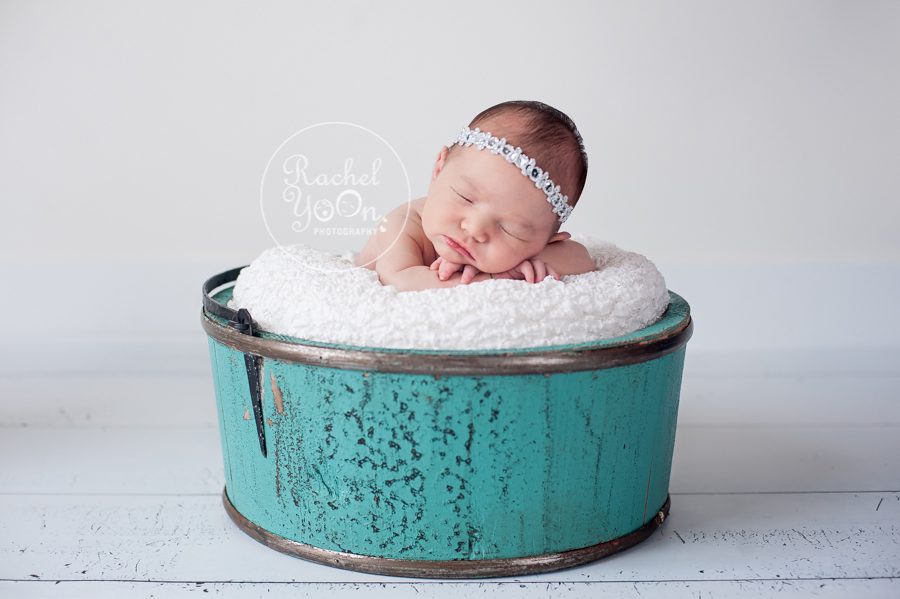 newborn baby girl in a basket - newborn photography vancouver