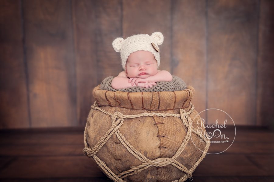 newborn baby boy in a basket - newborn photography vancouver