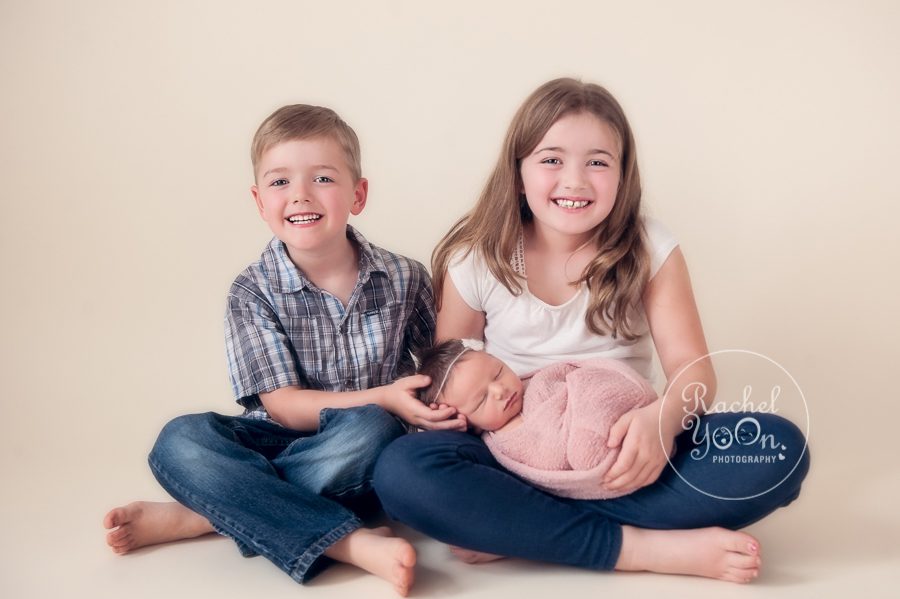 newborn baby girl with siblings - newborn photography vancouver