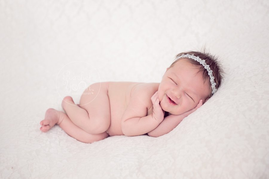 newborn baby girl smiling - newborn photography vancouver