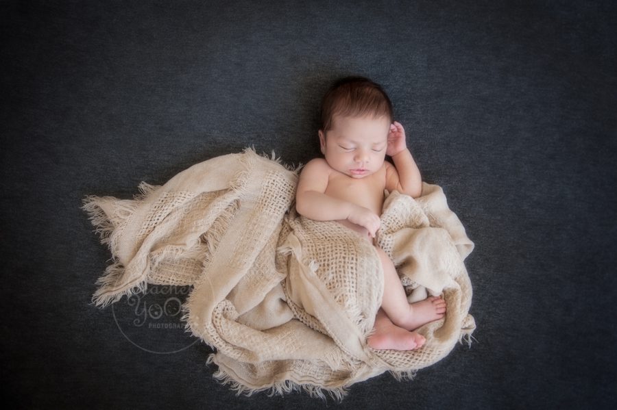 newborn baby on a bean bag - newborn photography vancouver