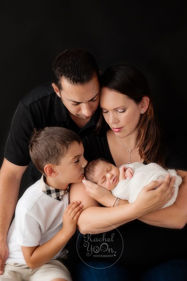 newborn baby with family - newborn photography vancouver