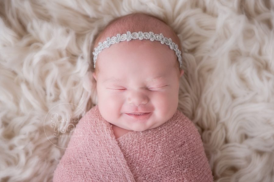 smily newborn baby girl - newborn photography vancouver