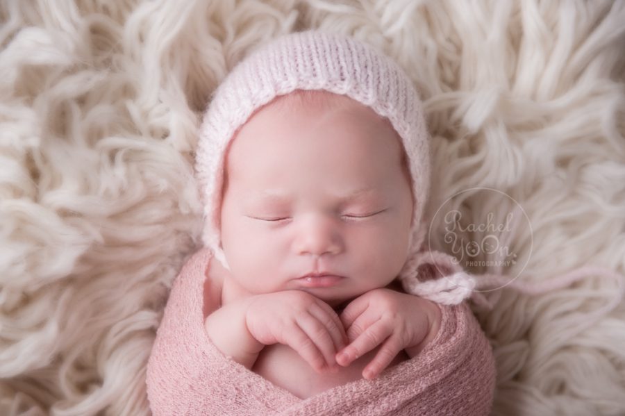 newborn baby girl wrapped in pink - newborn photography vancouver