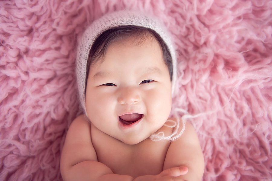 baby girl with a big smile - baby photography vancouver