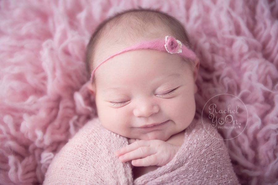 smiling newborn baby girl - newborn photography vancouver