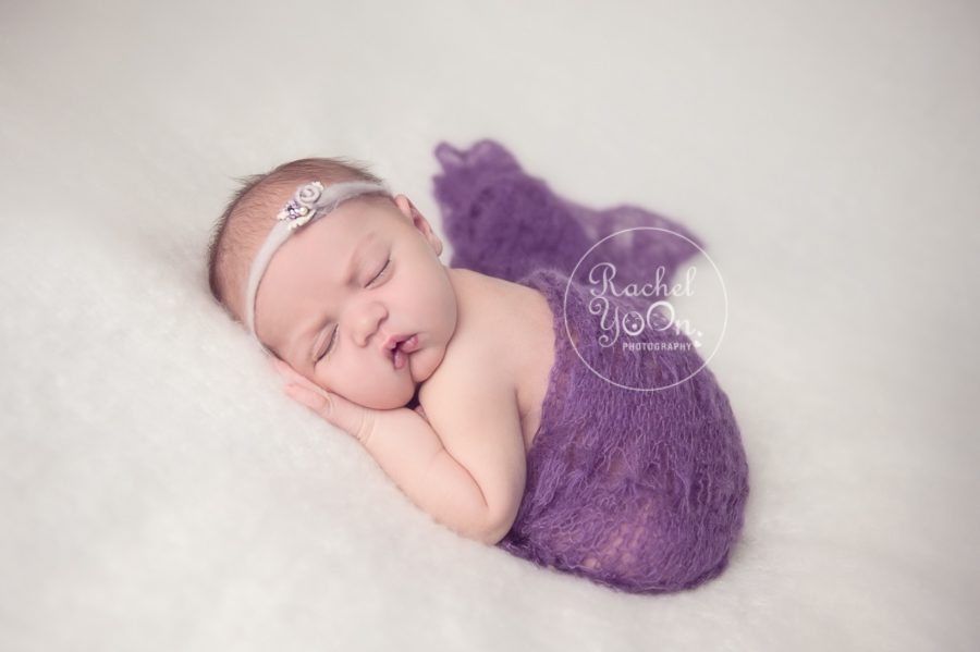 newborn baby girl in purple - newborn photography vancouver