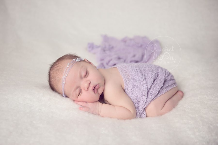 newborn baby girl in the taco pose - newborn photography vancouver