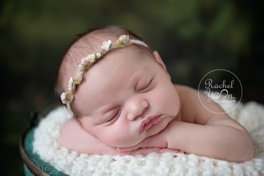 newborn baby girl close up in a basket - newborn photography vancouver