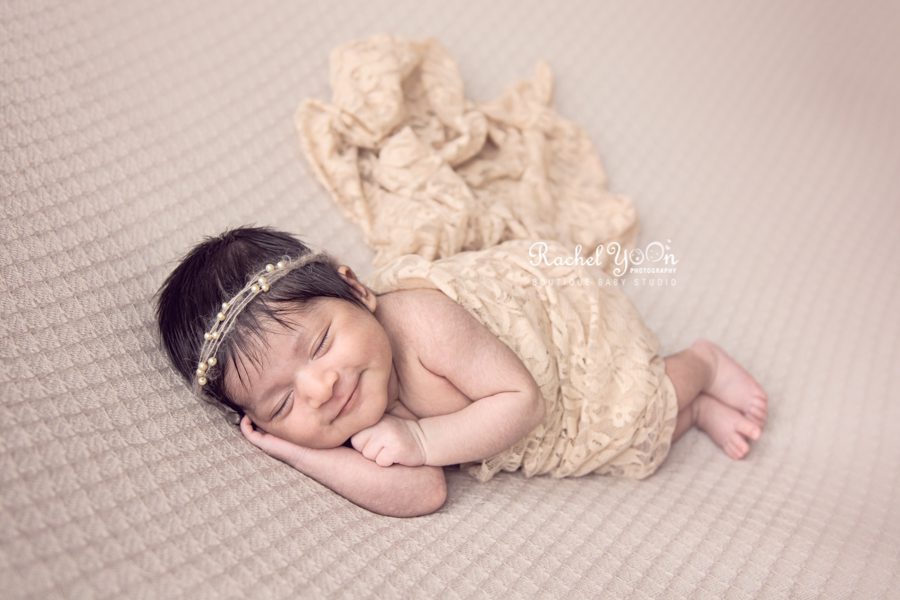 big smile from a newborn baby girl - newborn photography vancouver
