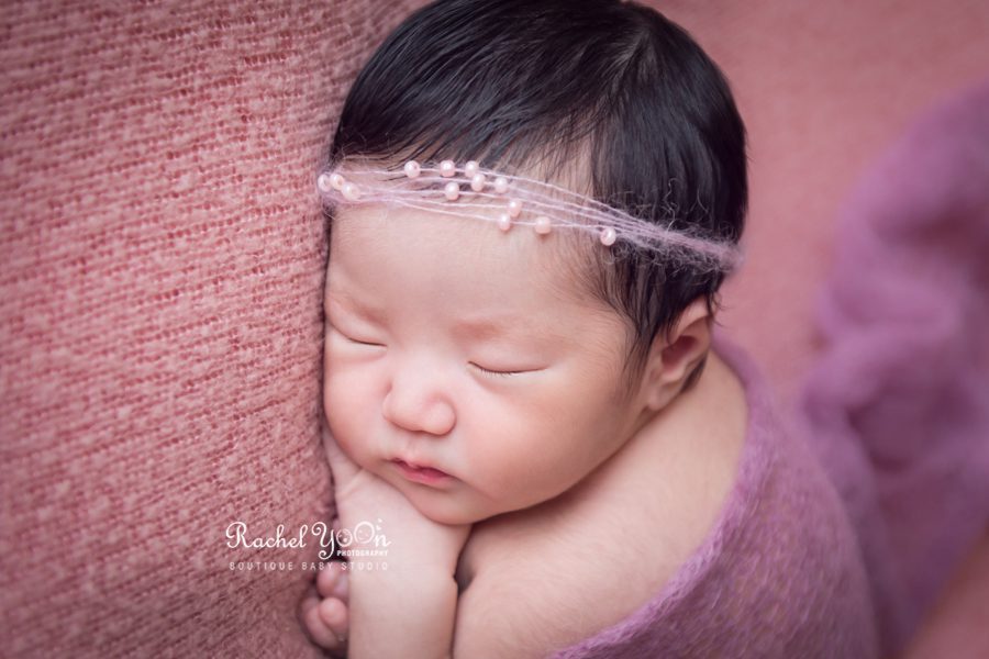 newborn baby girl in taco pose close up - newborn photography vancouver