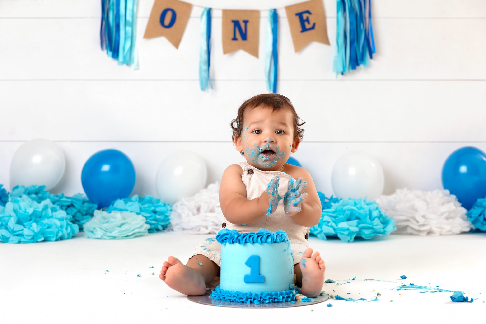 blue themed cake smash for baby boy